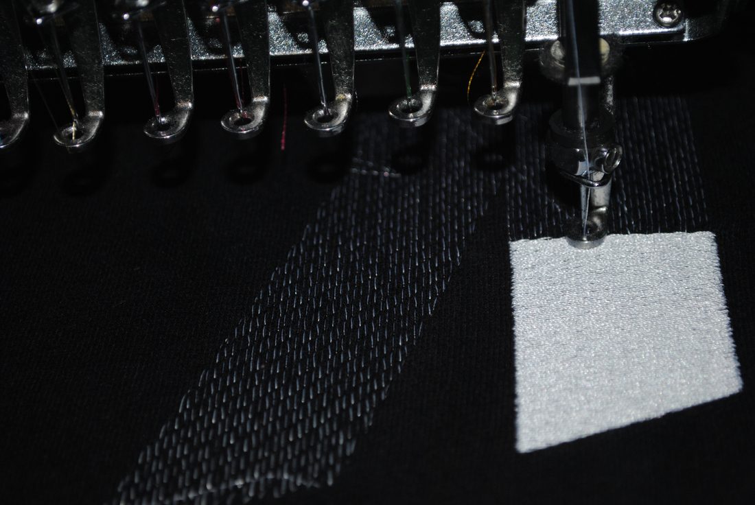 Tajima embroidery machine mid-stitch