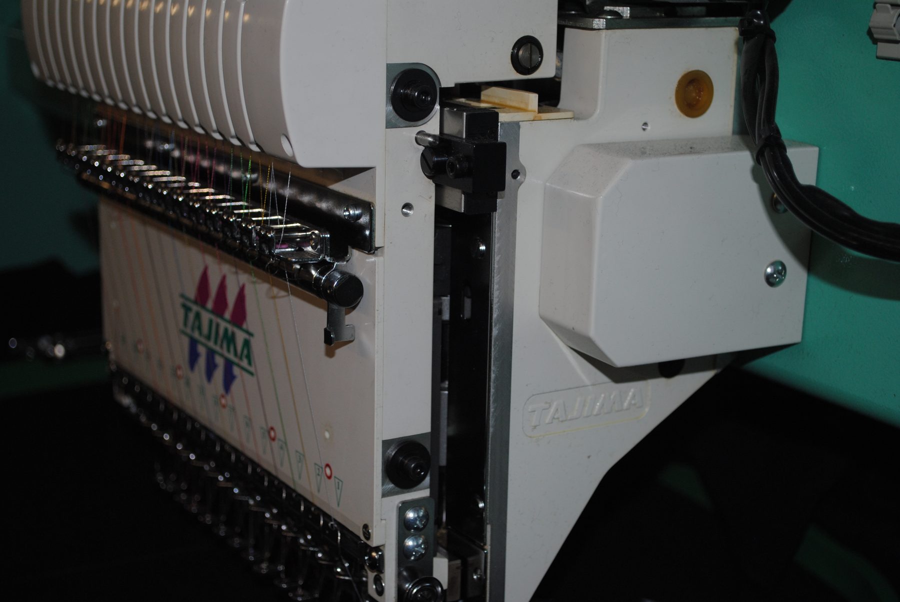 Industrial Tajima embroidery machine stitching at NobleNeedle
